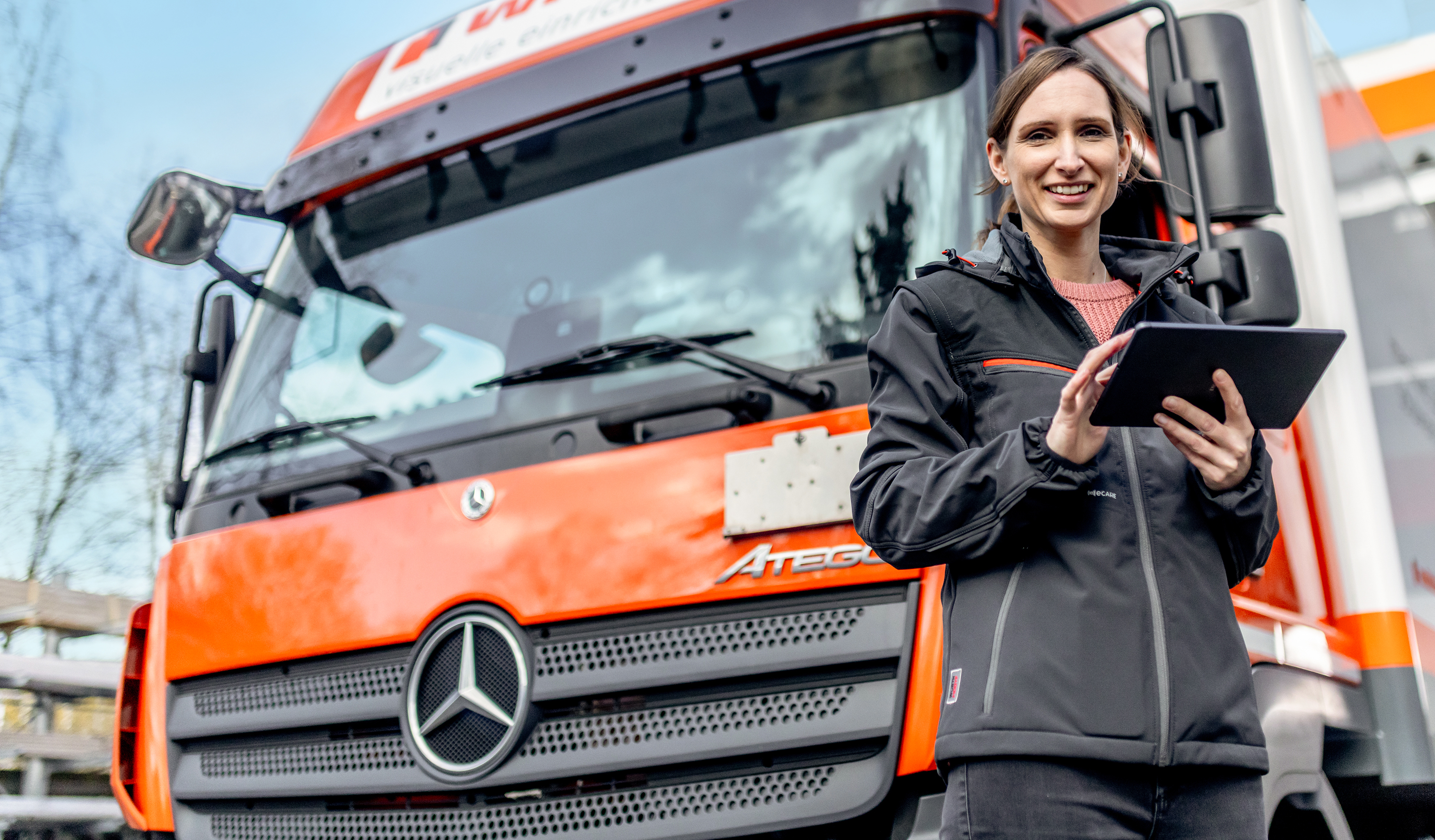 Wittler Service, Frau vor LKW